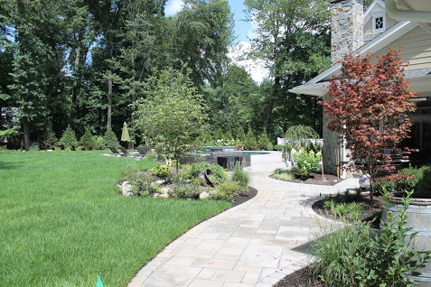 Stone Walkway and Landscaping Design and Installation by Curti's Landscaping